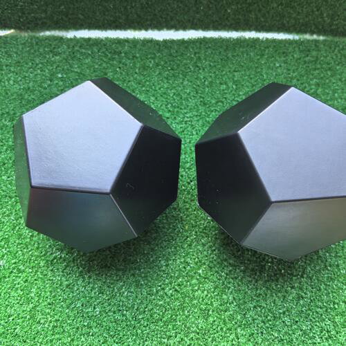Two black 12-sided PU foam dice